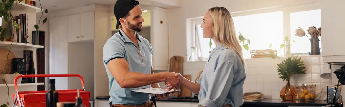 A home service professional meeting a homeowner